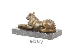 Modern Bronze Sculpture of a Cat Leaning on Black Marble