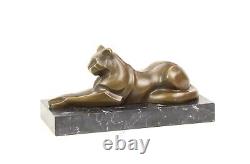 Modern Bronze Sculpture of a Cat Leaning on Black Marble