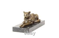 Modern Bronze Sculpture of a Cat Leaning on Black Marble