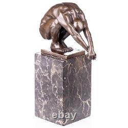 Modern bronze nude male sculpture on a vintage marble Signed