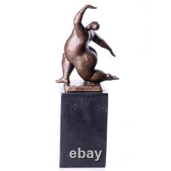 Modern bronze sculpture of a naked woman on black marble after Milo