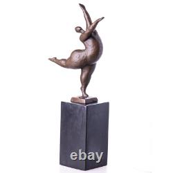 Modern bronze sculpture of a naked woman on black marble after Milo