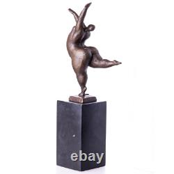 Modern bronze sculpture of a naked woman on black marble after Milo