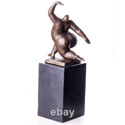 Modern bronze sculpture of a naked woman on black marble after Milo