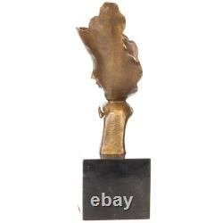 Modern bronze sculpture with abstract face on black marble signed