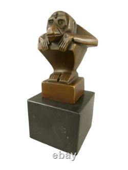 Modern signed bronze sculpture on a black marble base after C. Brau