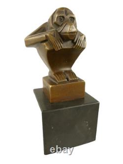 Modern signed bronze sculpture on a black marble base after C. Brau