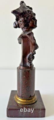 Old bronze woman with a bicorne, on a marble pedestal signed P. Koralzewski