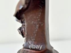 Old bronze woman with a bicorne, on a marble pedestal signed P. Koralzewski