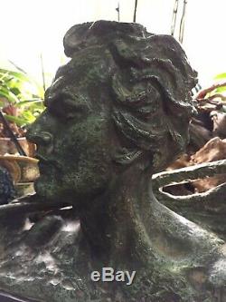 Ouline Alexander. Bust Dhomme. A Bronze Patina Green On Black Marble Base