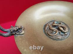 Pair of bronze and marble cups signed J Moigniez with lizard grasshopper decoration.