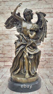 Sculpture Statue in Marbled Bronze of a Large Muscular Angel Signed with a Child