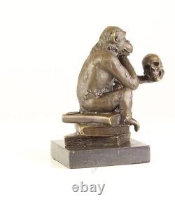 Sculpture of Darwin's Philosophizing Monkey on a Black Marble After Milo