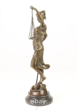 Sculpture of Lady Justice in bronze on a black marble base after Mayer