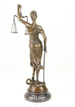 Sculpture of Lady Justice in bronze on a black marble base after Mayer