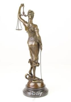 Sculpture of Lady Justice in bronze on a black marble base after Mayer
