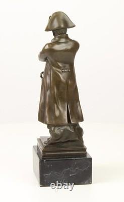 Sculpture of Napoleon's stature on a black marble pedestal after Claude