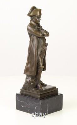 Sculpture of Napoleon's stature on a black marble pedestal after Claude