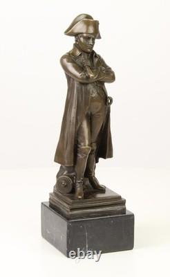 Sculpture of Napoleon's stature on a black marble pedestal after Claude