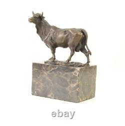 Sculpture of a Bull on Black Marble After Milo