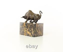 Sculpture of a Bull on a Black Marble After Milo