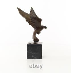 Sculpture of a Flying Pigeon on a Black Marble Base after Ceonard