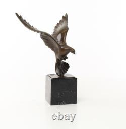 Sculpture of a Flying Pigeon on a Black Marble Base after Ceonard