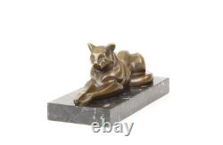 Sculpture of a Modern Cat Lying on Black Marble after Michel Decoux
