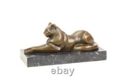 Sculpture of a Modern Cat Lying on Black Marble after Michel Decoux
