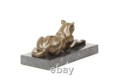 Sculpture of a Modern Cat Lying on Black Marble after Michel Decoux