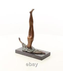 Sculpture of a Naked Woman in Bronze on Black Marble after Nick