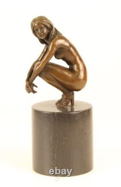 Sculpture of a Nude Woman Sitting in Bronze on a Black Marble Base after Claude