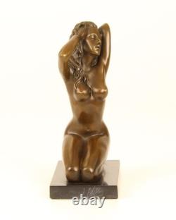 Sculpture of a Nude Woman Sitting in Bronze on a Black Marble Base after Claude