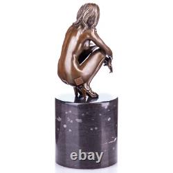 Sculpture of a Nude Woman Sitting in Bronze on a Black Marble Base after Milo