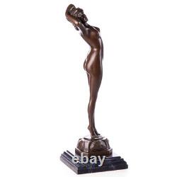 Sculpture of a Woman Awakening in bronze on a black marble base after Philips