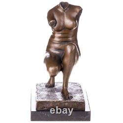 Sculpture of a female torso in bronze on a marble pedestal after Milo