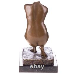 Sculpture of a female torso in bronze on a marble pedestal after Milo