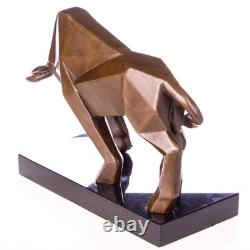 Sculpture of a modern cubist bull in bronze on black marble after Milo
