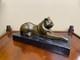 Sculpture Of A Modern Reclining Cat On Black Marble By Michel Decoux