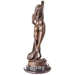 Sculpture of a nude woman in bronze on a black marble base after P. Delor