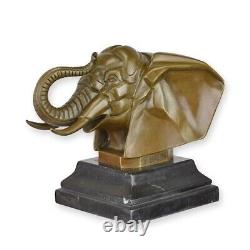 Sculpture of an Elephant Head in Bronze on a Black Marble Base Signed