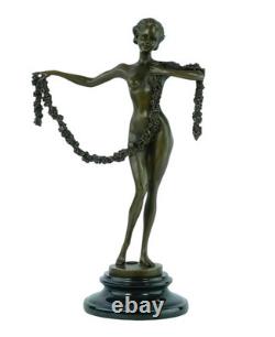 Sculpture of the Dancer of Garland in bronze on a black marble base Signed