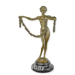 Sculpture of the Dancing Girl in bronze on a black marble base Signed