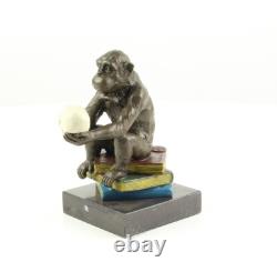 Sculpture of the Darwin Monkey Philosopher in bronze on a marble base signed