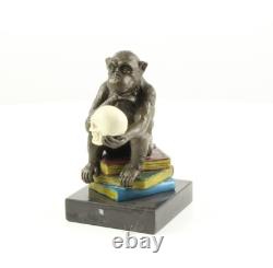 Sculpture of the Darwin Monkey Philosopher in bronze on a marble base signed