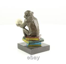 Sculpture of the Darwin Monkey Philosopher in bronze on a marble base signed