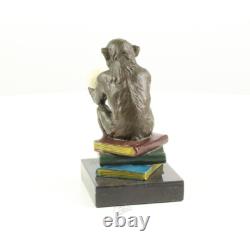 Sculpture of the Darwin Monkey Philosopher in bronze on a marble base signed