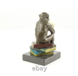 Sculpture of the Darwin Monkey Philosopher in bronze on a marble base signed