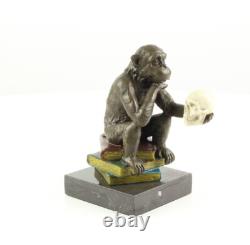 Sculpture of the Darwin Monkey Philosopher in bronze on a marble base signed