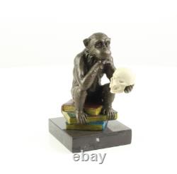 Sculpture of the Darwin Monkey Philosopher in bronze on a marble base signed